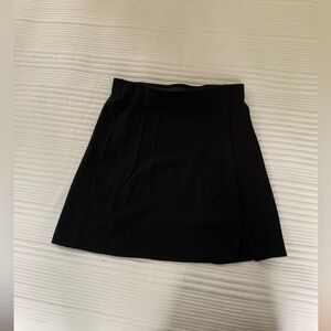 Black mini skirt with small slit